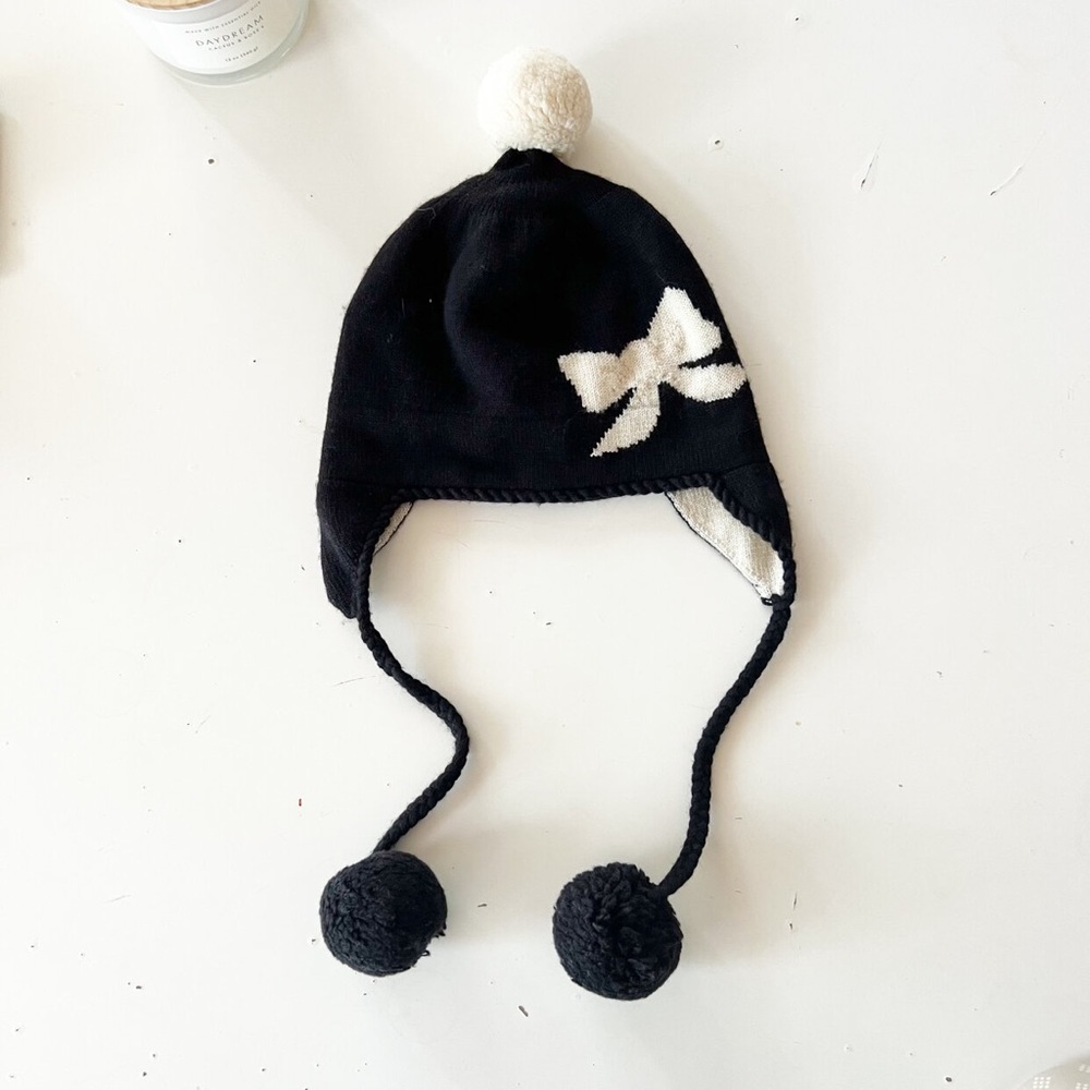 Kate Spade wool pom pom knit hat with bow and tassels